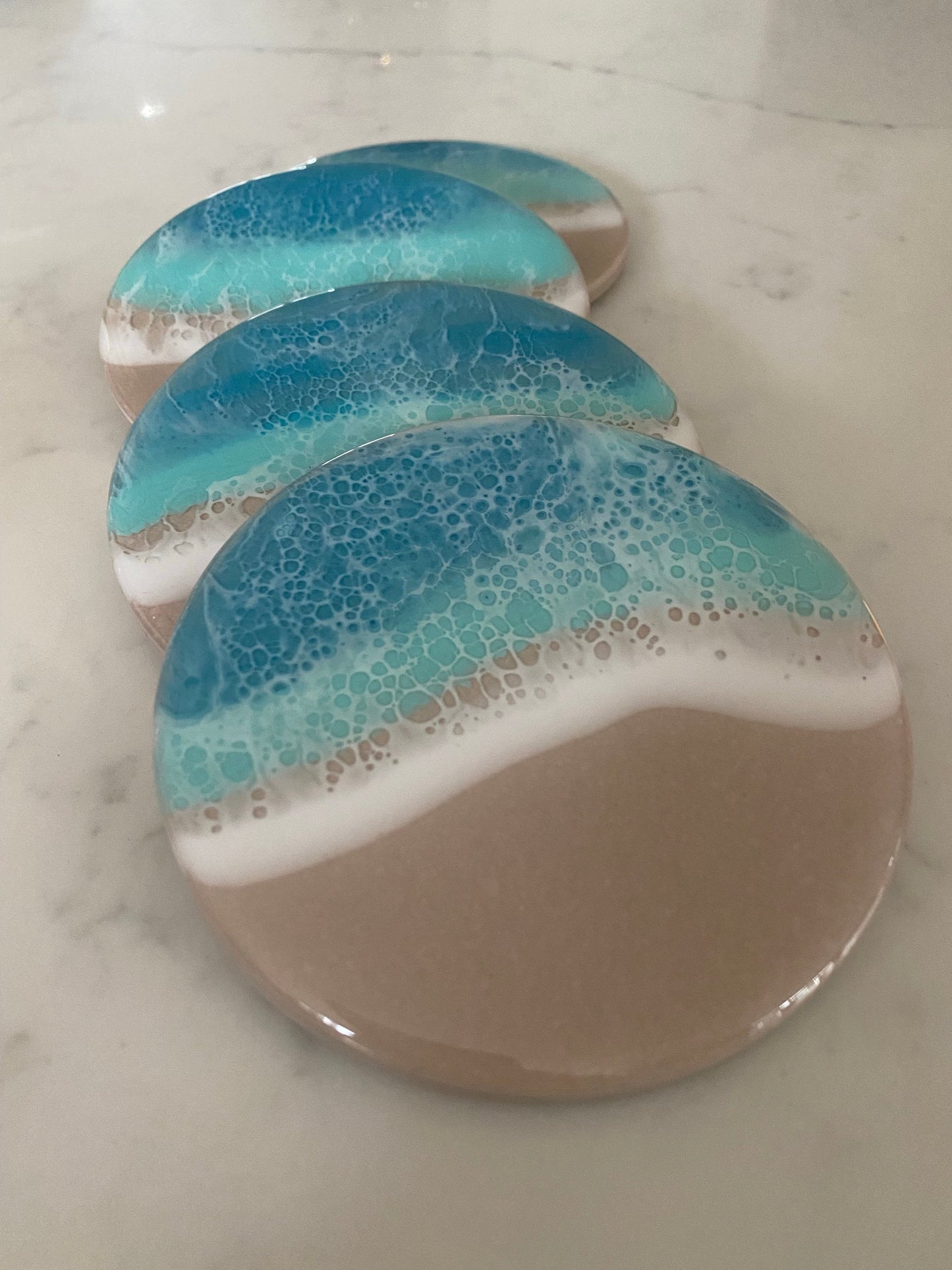 Ceramic ocean coasters. π (set of four)