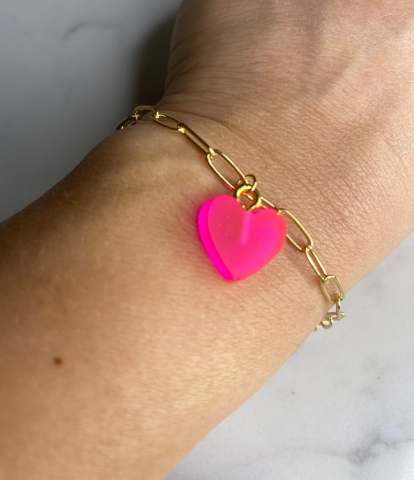 Paperclip chain bracelet with mini hand poured neon pink resin heart