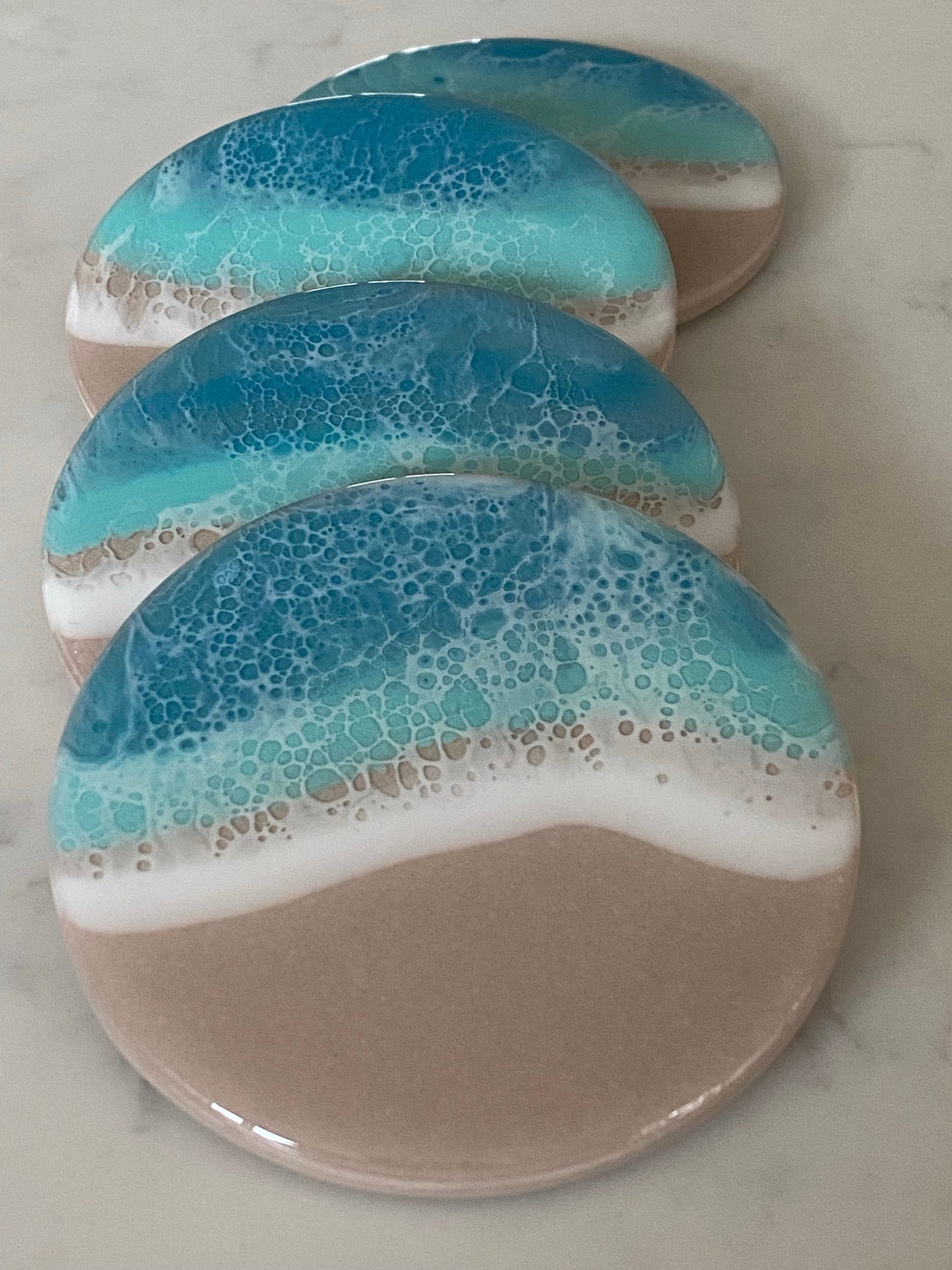 Ceramic ocean coasters. π (set of four)