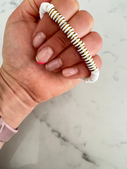 Gold and white heishi bead bracelet.