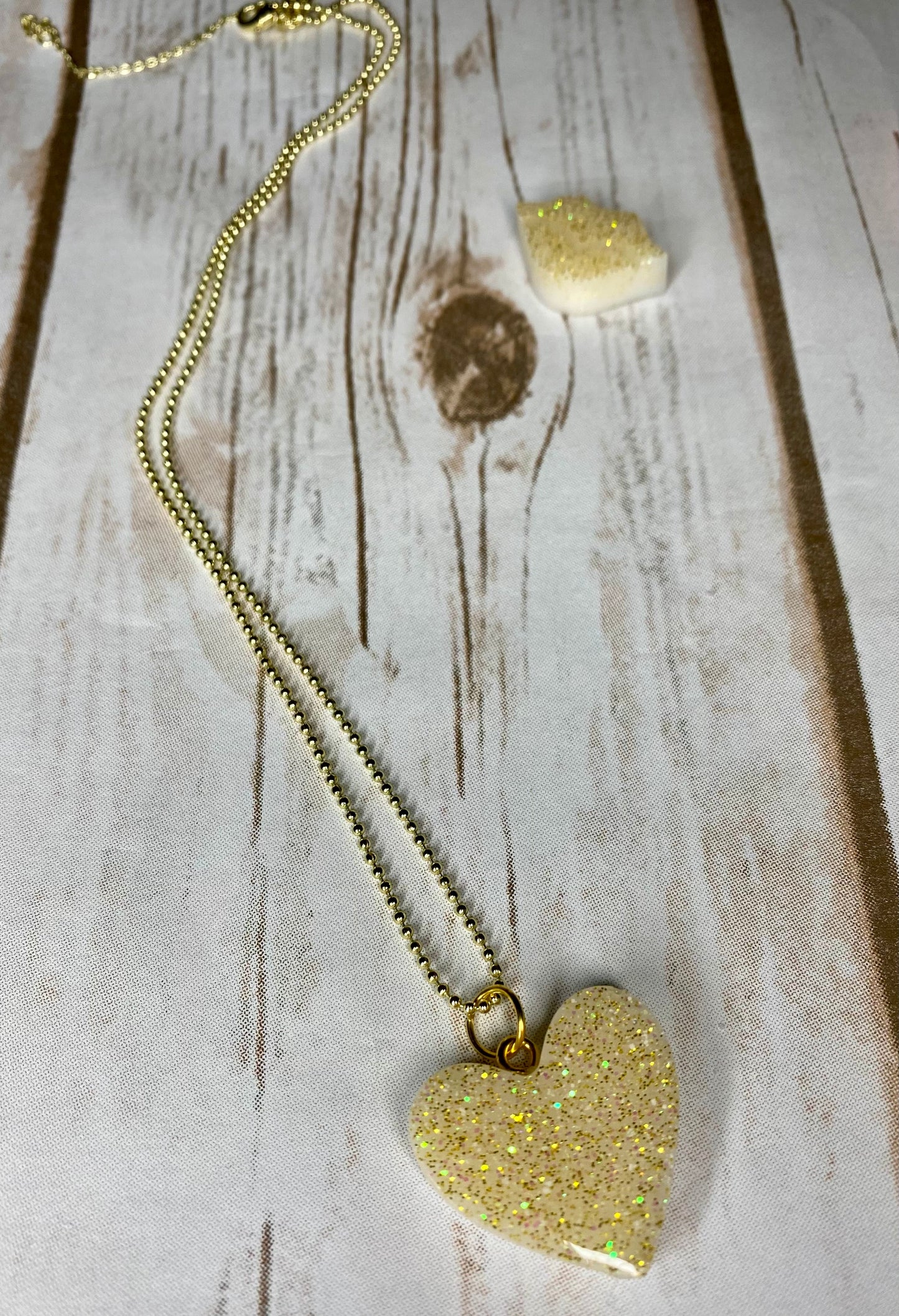 Gold resin heart necklace with 14k paper lip style trendy necklace. (Not ball chain seen here)