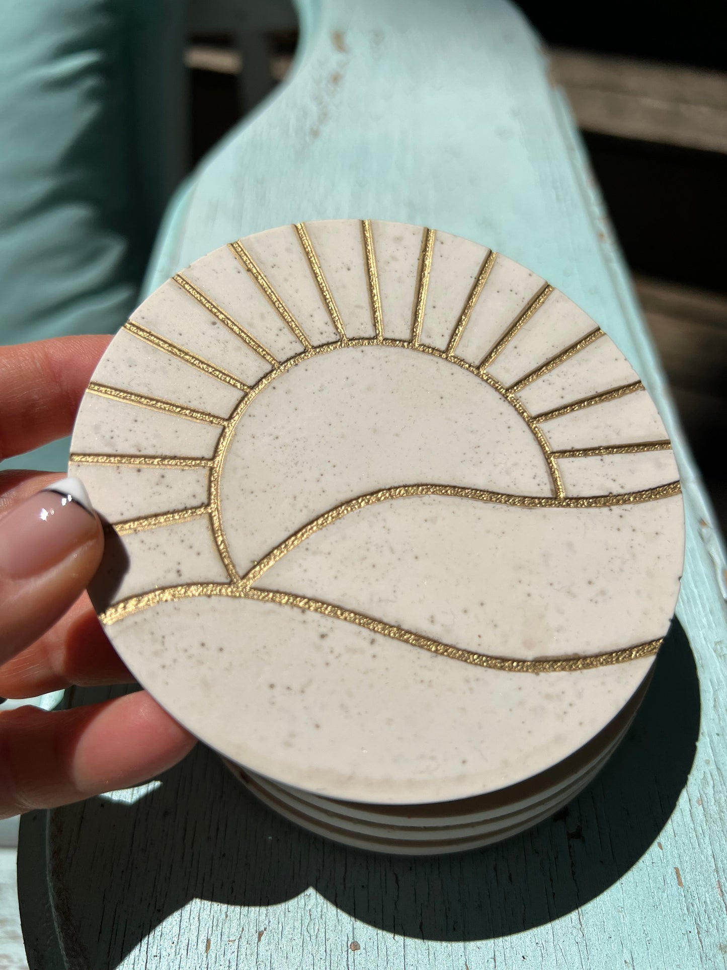 Concrete look gold sun coasters