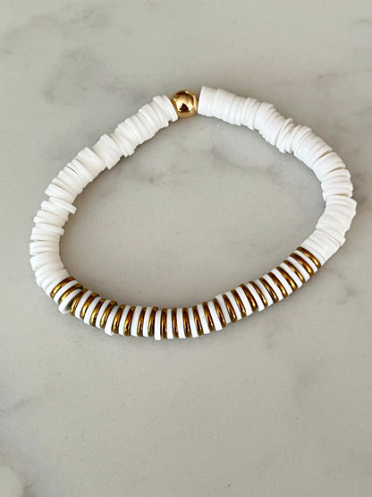 Gold and white heishi bead bracelet.