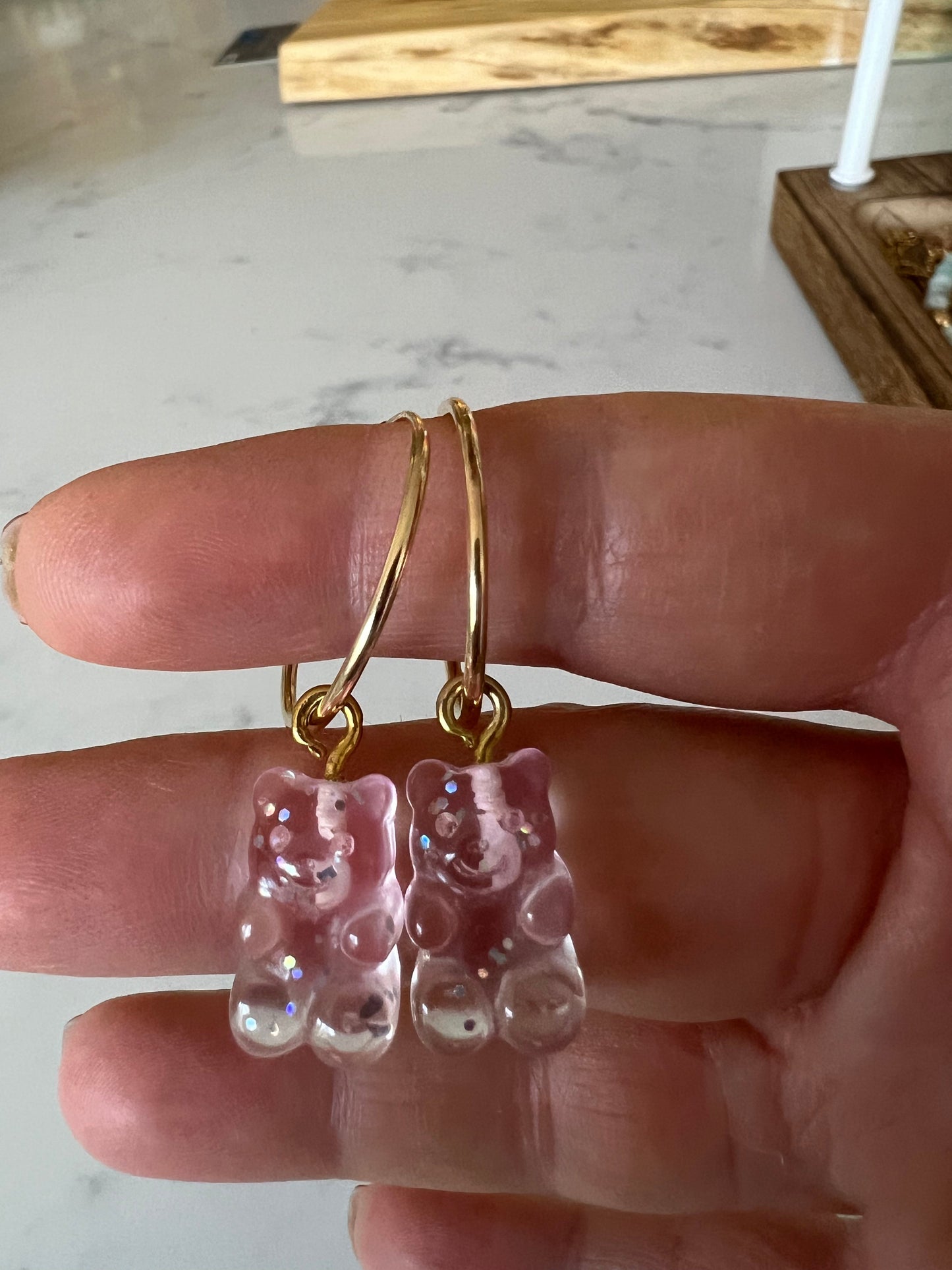 Mini sparkly pink gummy bears in gold fill hoops