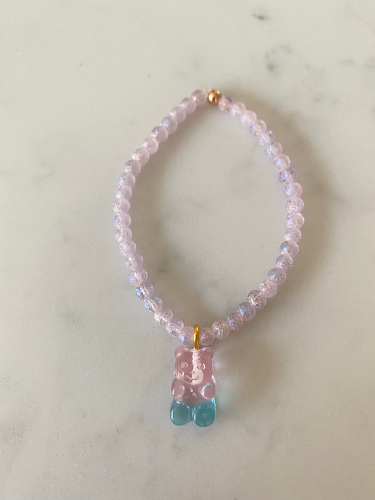 Pink bead bracelet with gummy bear charm