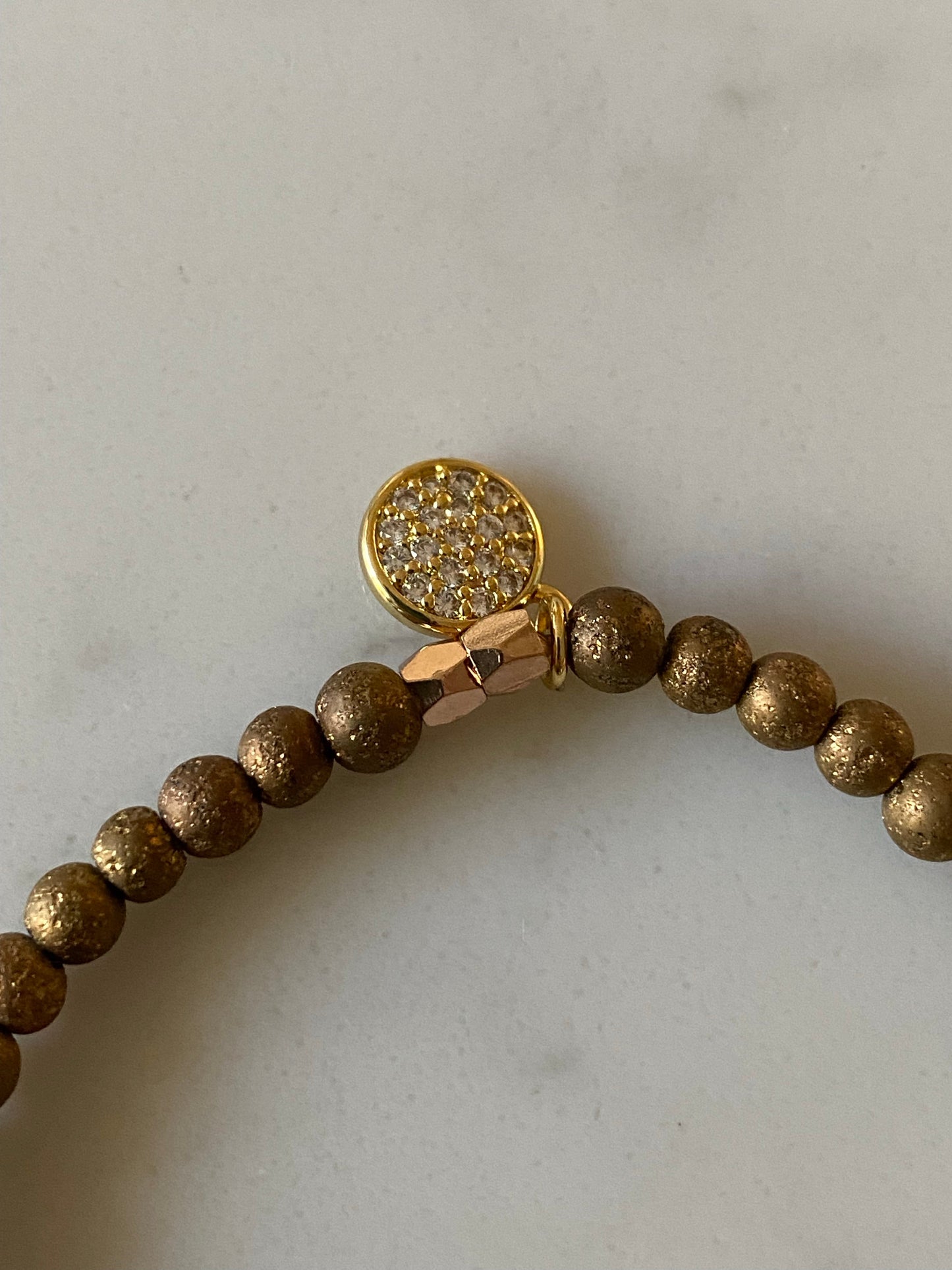 Bracelet with resin charm and gold filled charm.