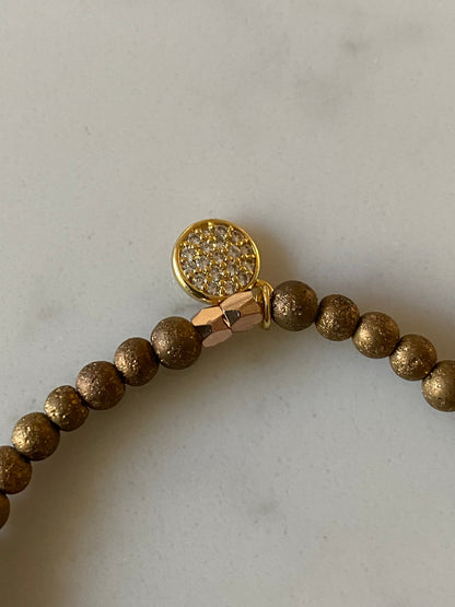 Bracelet with resin charm and gold filled charm.