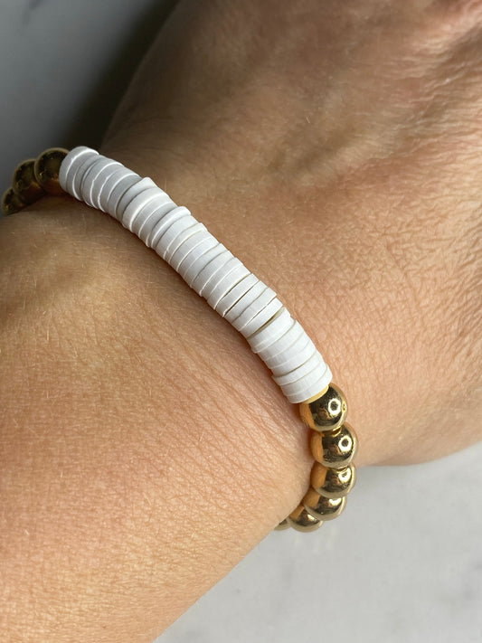 White heishi beads with gold plated hematite beads