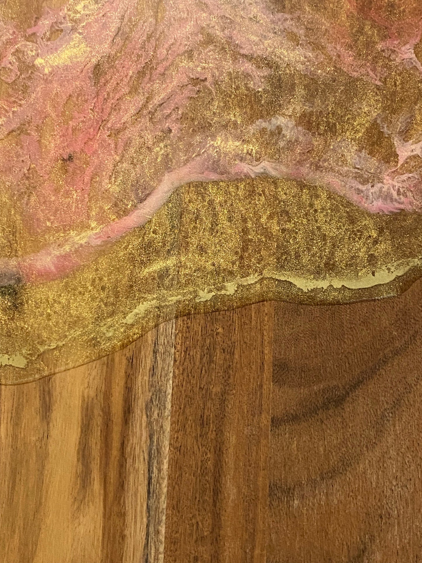 Gold and pink resin cheese board.