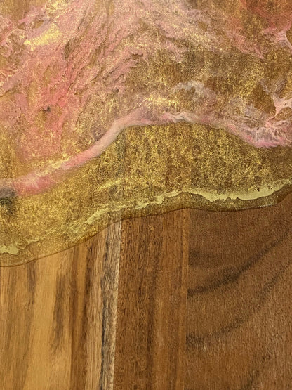 Gold and pink resin cheese board.
