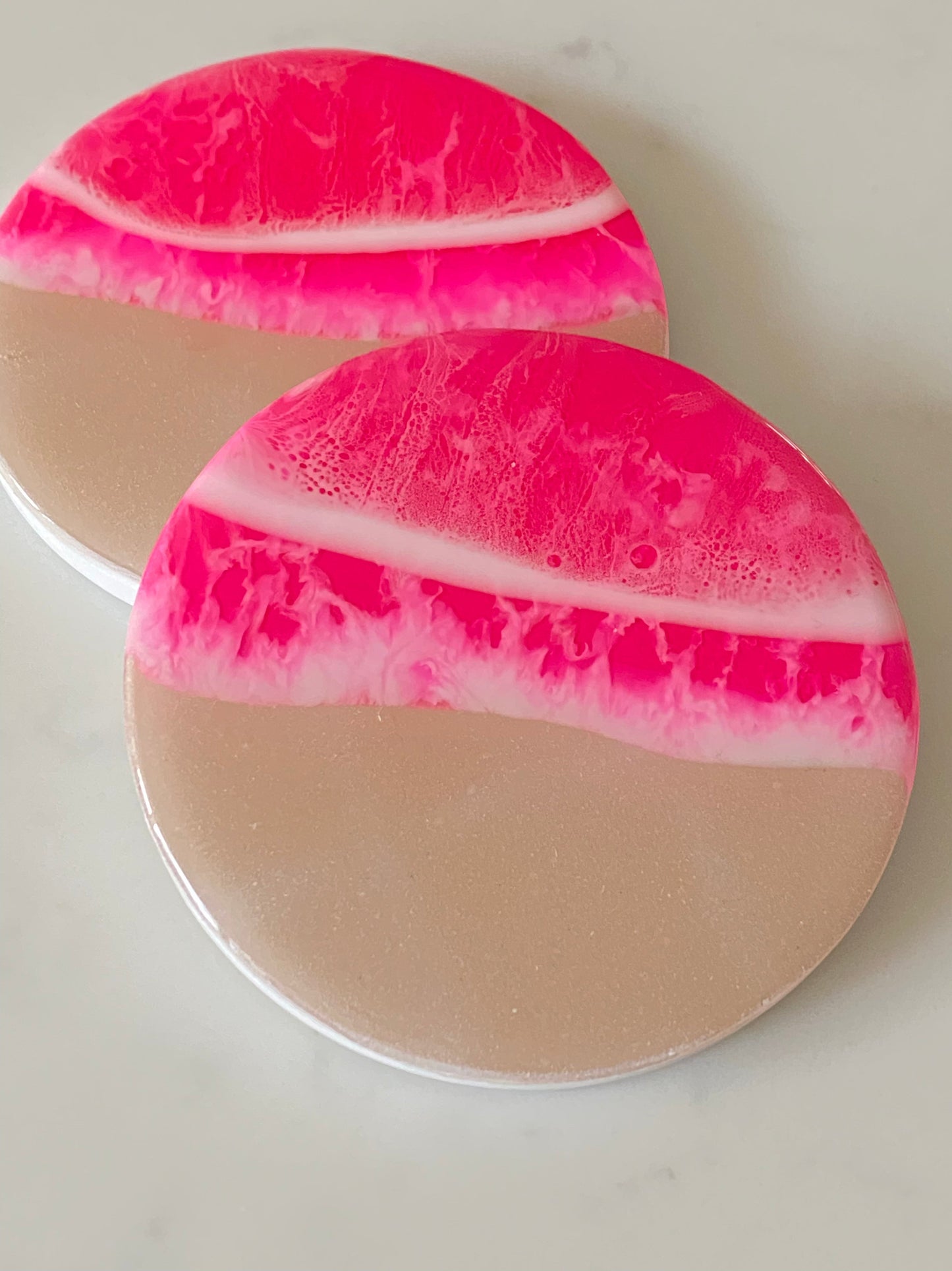 Set of two neon pink ocean coasters