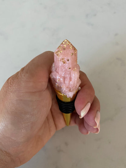 Blush and gold wine stopper.