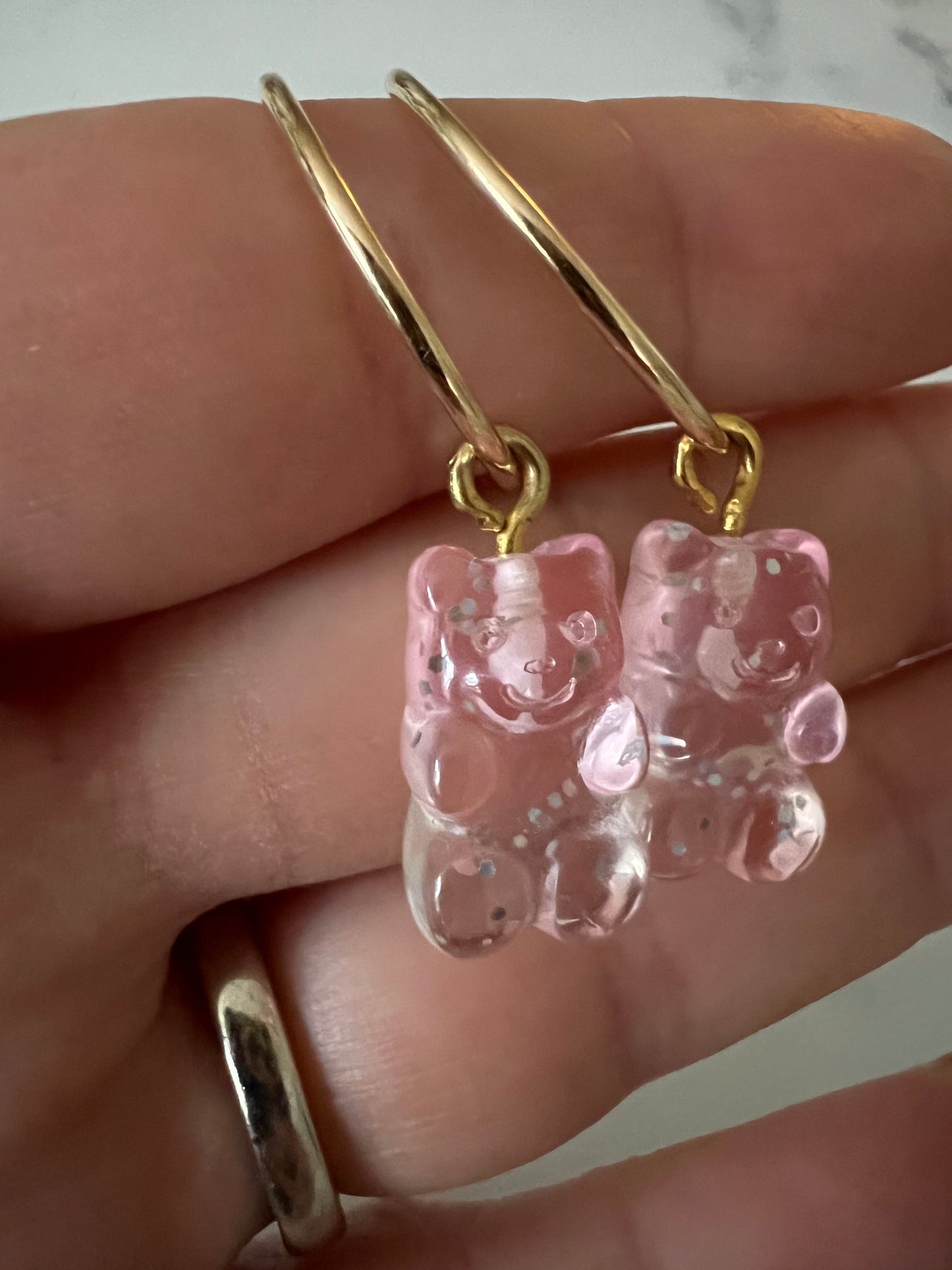Mini sparkly pink gummy bears in gold fill hoops