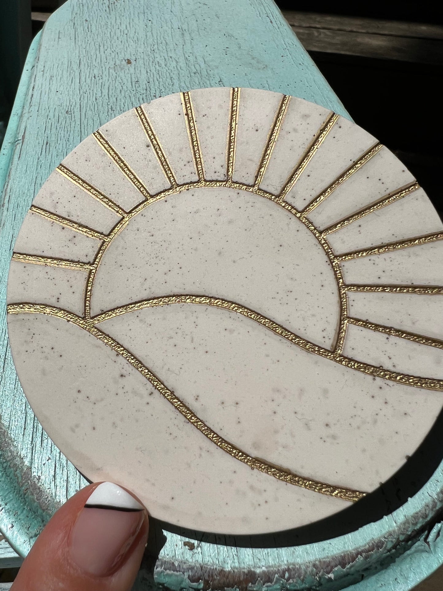 Concrete look gold sun coasters