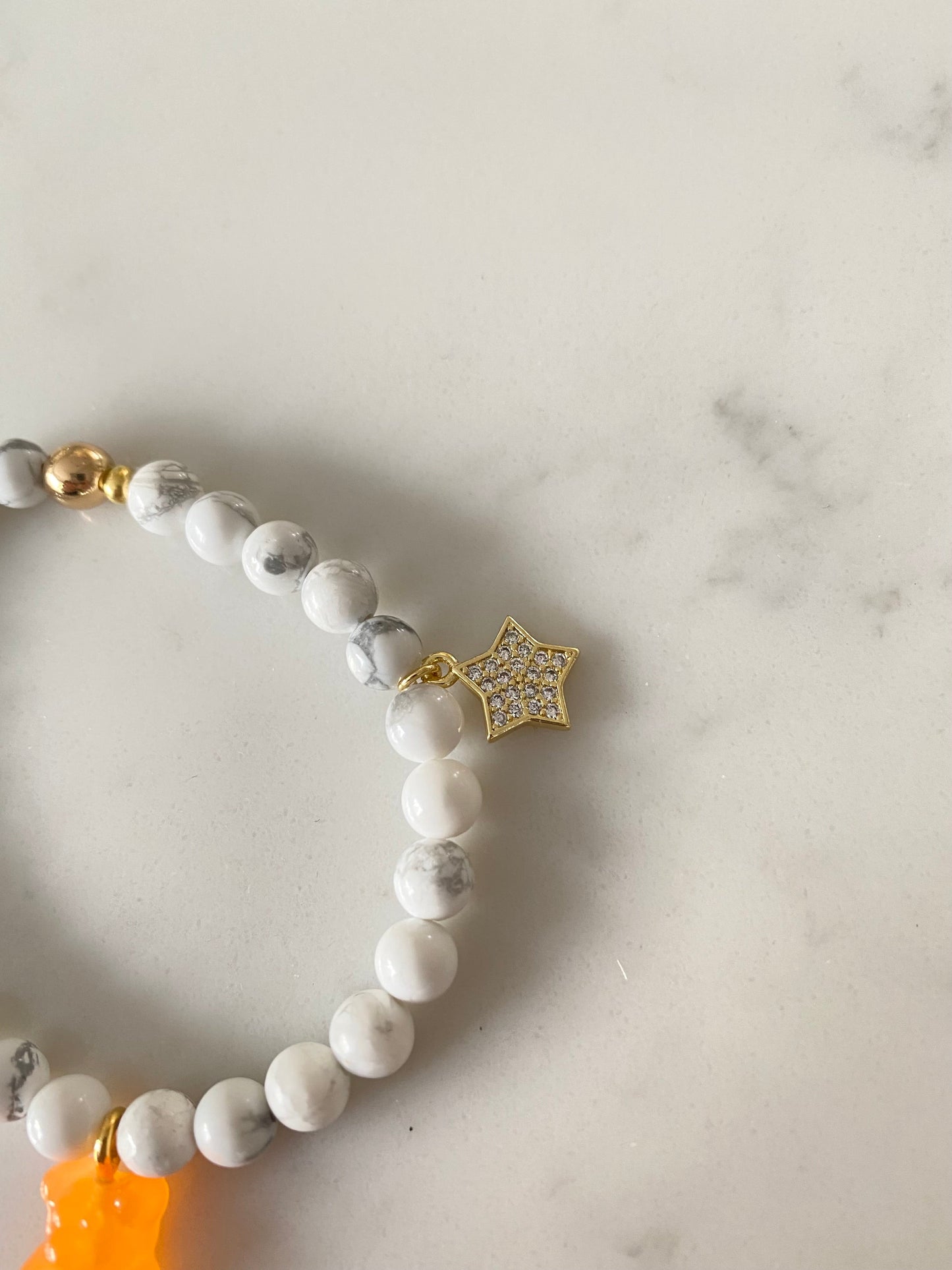 Natural gemstone bracelet with pave gold plated charm and resin gummy bear