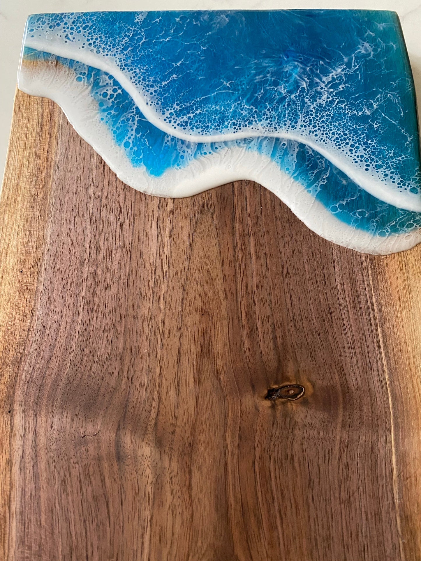 Ocean resin on reclaimed walnut charcuterie