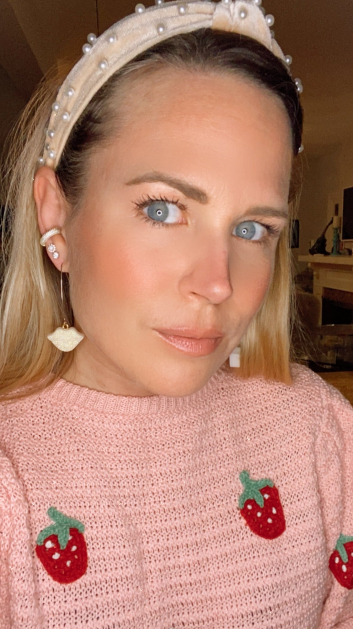 Sparkly resin lip 👄 earrings dangling from 14k gold plated hoops or danglers.