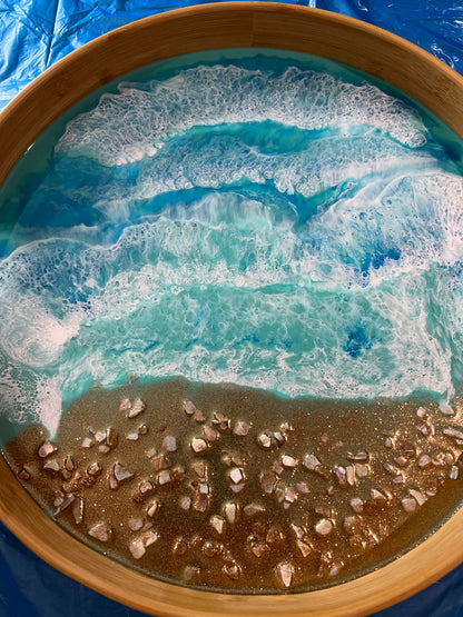 Large round bamboo serving tray with resin ocean