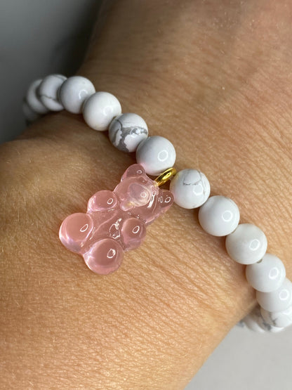 Natural gemstone bracelet with pink resin gummy bear.
